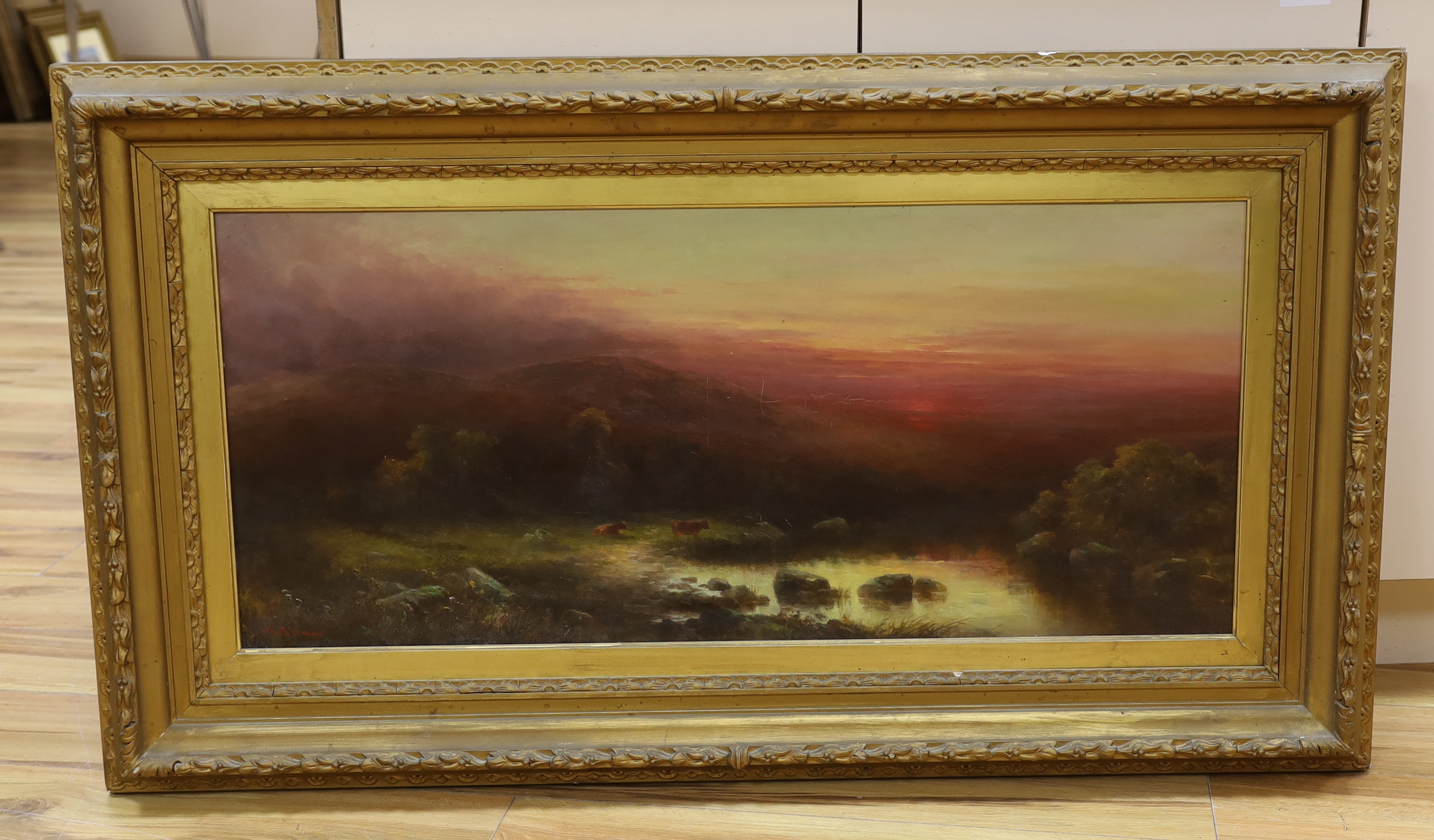 George Shaw (1843-1915), oil on canvas, Extensive highland scene with cattle beside a river, signed, 44 x 99cm, ornate gilt framed
